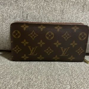 Louis Vuitton zip wallet. Good condition.
